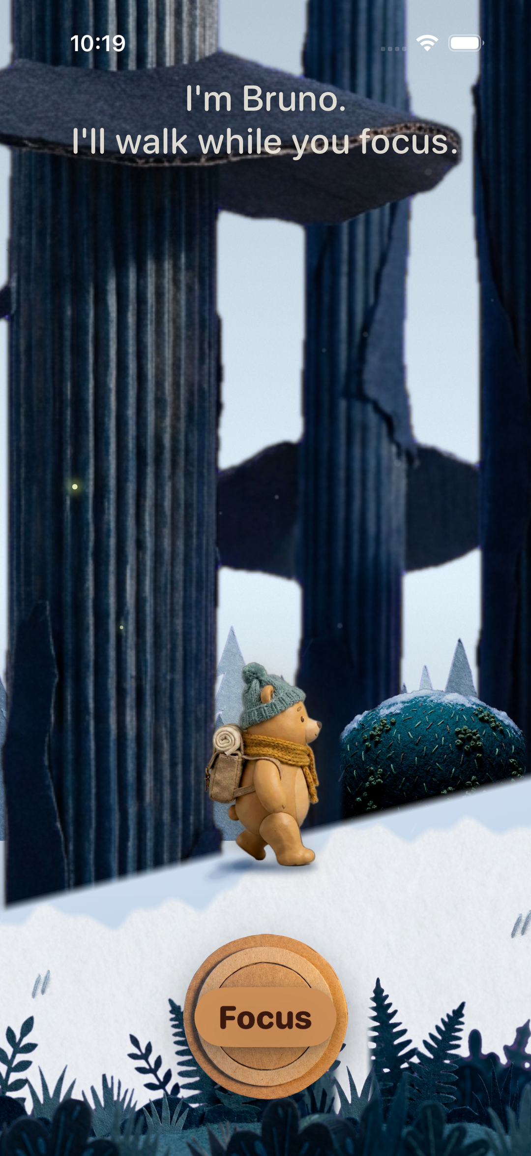 Bruno's Trail walk screen: "I'm Bruno. I'll walk while you focus," with a Focus button over a snowy felt-and-paper scene.